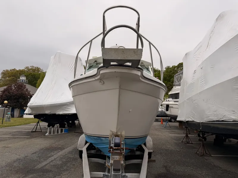 Slide: The Image of Baha Cruisers 272 Fisherman 2000 on a trailer outdoors. - 10