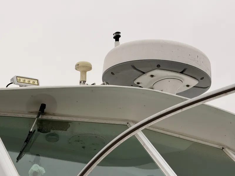 Slide: The Image of Baha Cruisers 272 Fisherman 2000 with radar and antenna. - 12