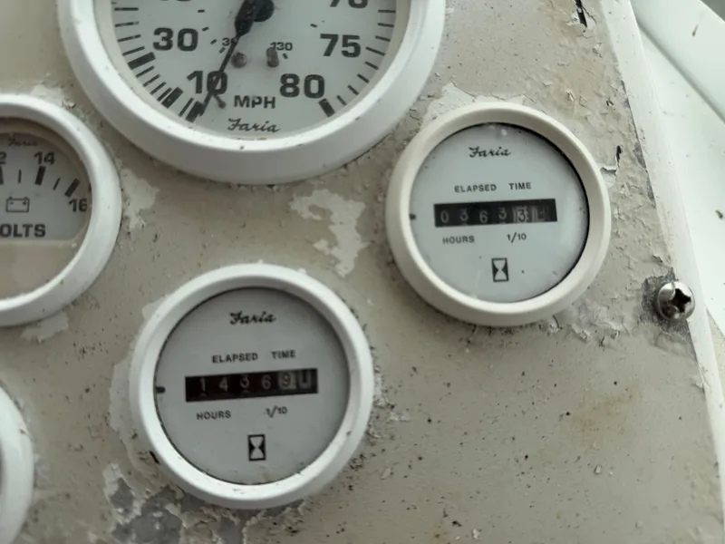 Slide: The Image of Dashboard of a 2000 Baha Cruisers 272 Fisherman with Faria instruments. - 33