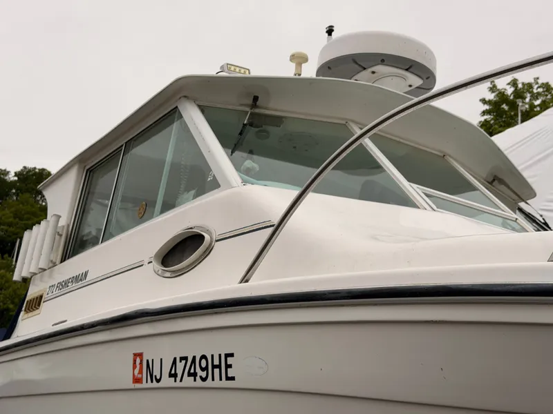 Slide: The Image of 2000 Baha Cruisers 272 Fisherman boat, close-up of the cabin. - 8