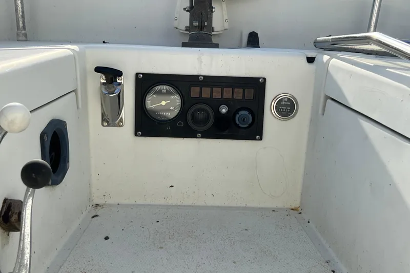 Slide: The Image of Control panel of a 1989 Pacific Seacraft Dana 24 sailboat cockpit. - 14