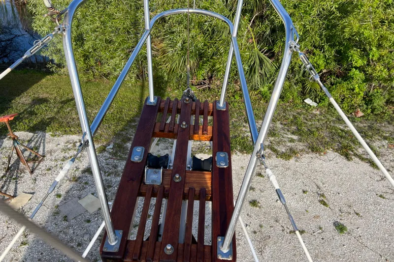 Slide: The Image of Pacific Seacraft Dana 24 sailboat bow pulpit with wooden platform, 1989 model. - 5