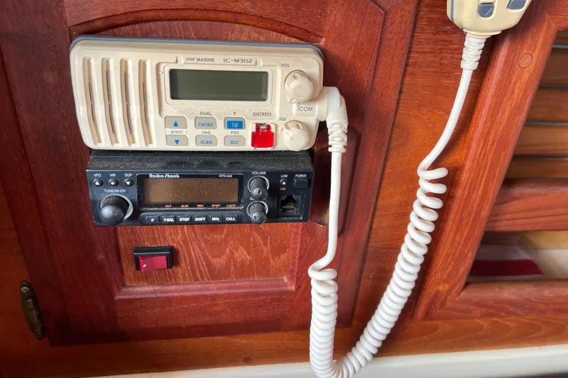 Slide: The Image of VHF marine radio and control panel on 1989 Pacific Seacraft Dana 24 sailboat. - 9