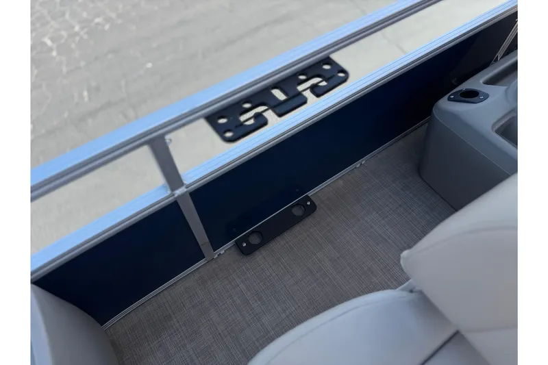 Slide: The Image of 2024 Sun Tracker Bass Buggy 18 DLX interior detail with seating and flooring. - 14