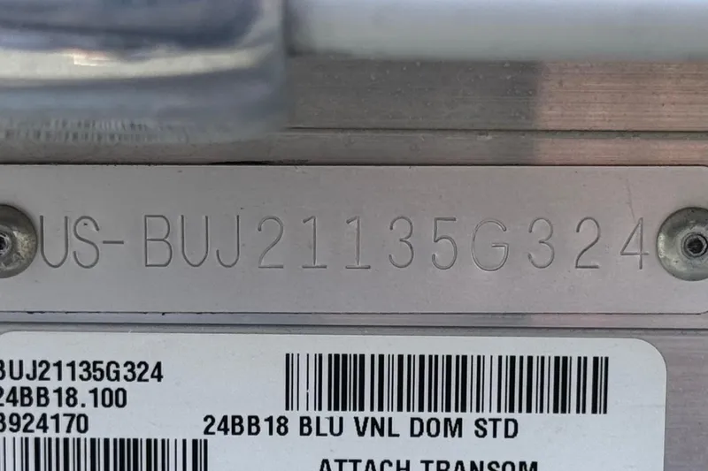 Slide: The Image of 2024 Sun Tracker Bass Buggy 18 DLX hull identification number and barcode details. - 27