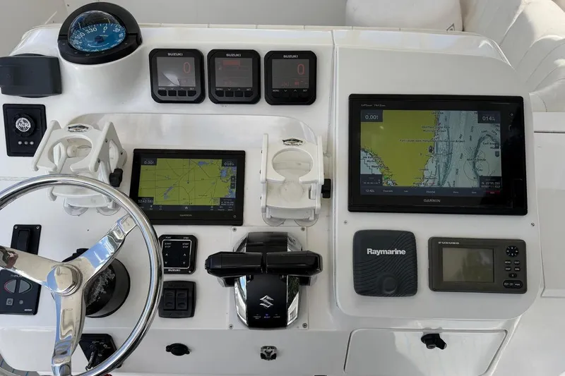 Slide: The Image of Helm of 2006 Intrepid 348 Walkaround with navigation and control systems. - 10