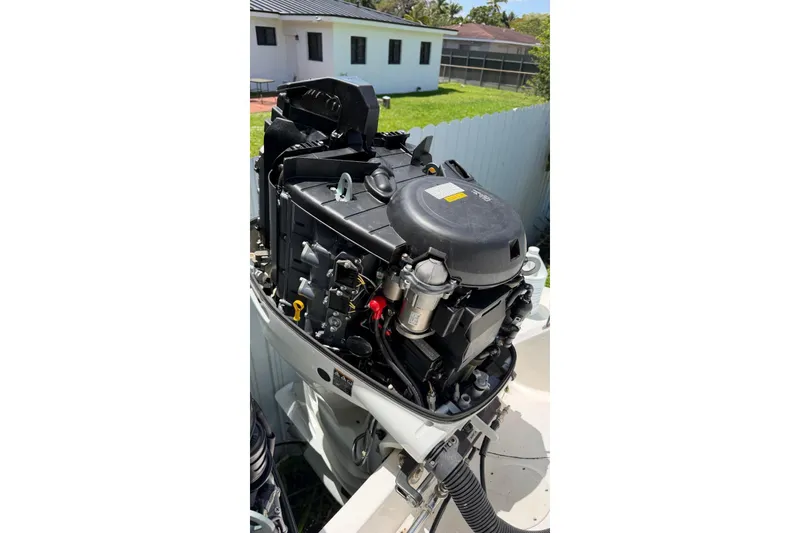 Slide: The Image of Outboard motor of a 2006 Intrepid 348 Walkaround boat, detailed view. - 14