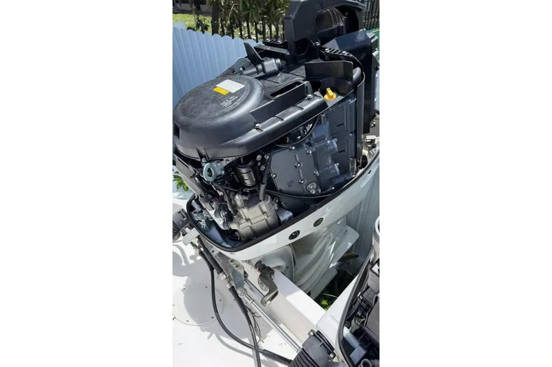 Slide: The Image of Outboard motor of a 2006 Intrepid 348 Walkaround boat, detailed view. - 18