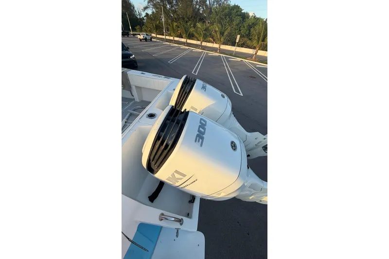 Slide: The Image of 2006 Intrepid 348 Walkaround with twin 300 horsepower engines in a parking lot. - 5
