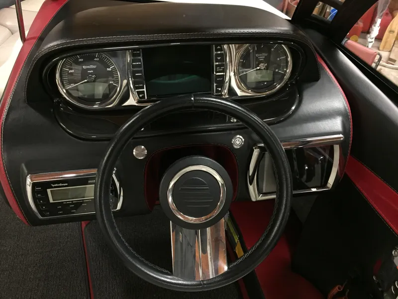 Slide: The Image of Dashboard of a 2013 Malibu Wakesetter 23 LSV boat. - 11