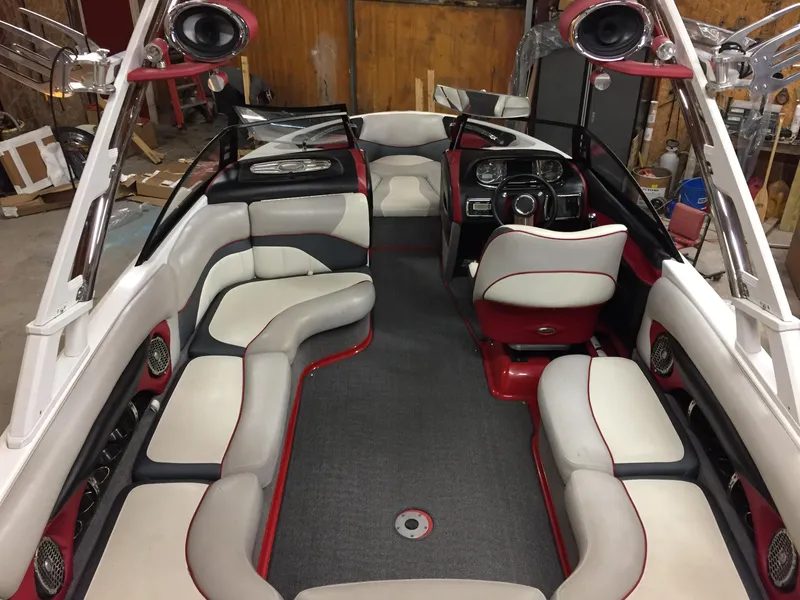 Slide: The Image of Interior of a 2013 Malibu Wakesetter 23 LSV boat with luxurious seating. - 16