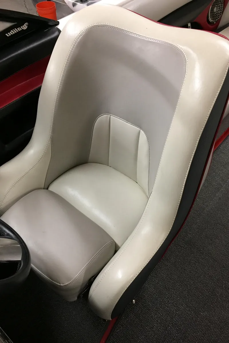 Slide: The Image of Interior of 2013 Malibu Wakesetter 23 LSV boat, white leather seats. - 17
