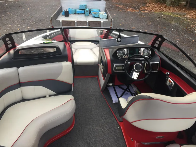 Slide: The Image of Interior of a 2013 Malibu Wakesetter 23 LSV boat with modern seating. - 21