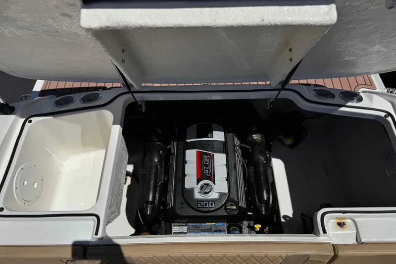 Slide: The Image of 2022 Bayliner VR4 Bowrider I/O engine compartment with 4.5L 200 HP engine. - 14