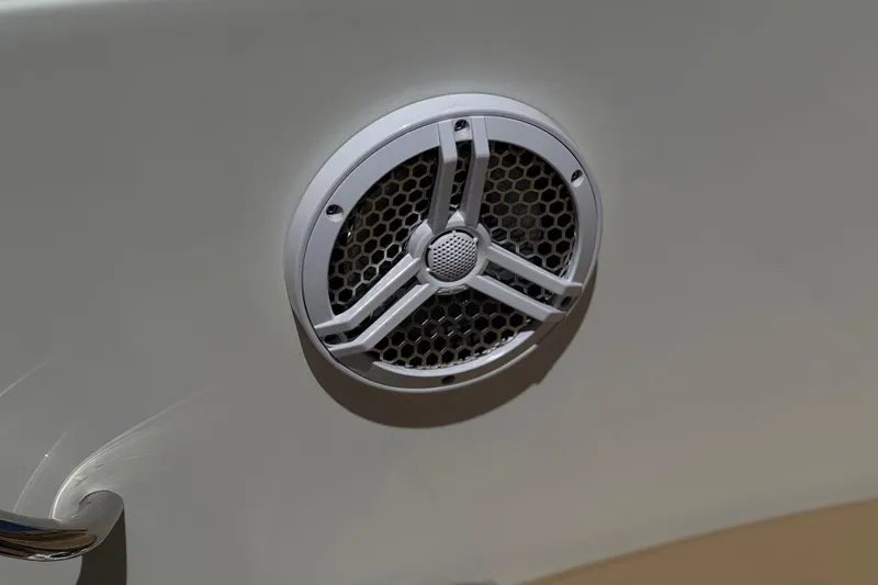 Slide: The Image of Close-up of a speaker on a 2022 Bayliner VR4 Bowrider I/O boat. - 17