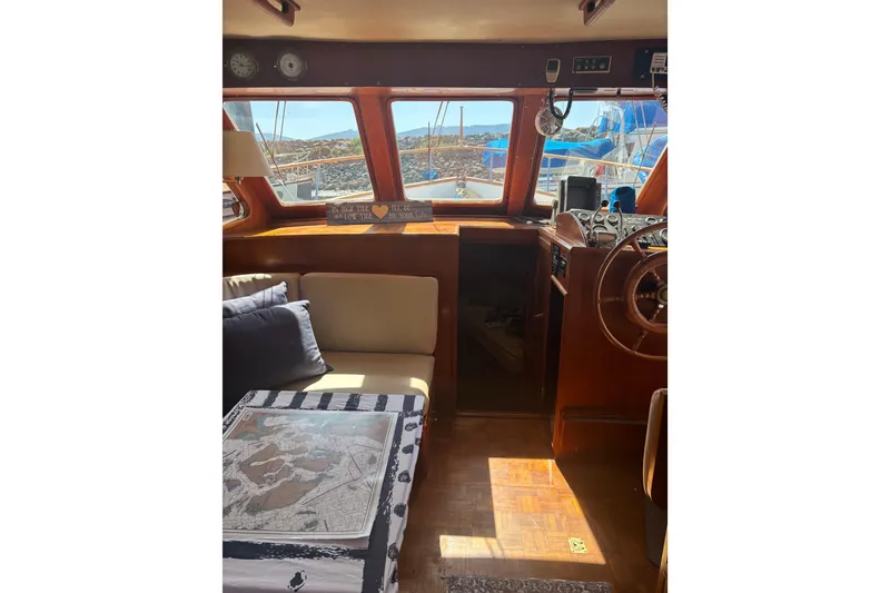 Slide: The Image of Interior of 1984 Ocean Alexander 38 Double Cabin with helm and seating area. - 15