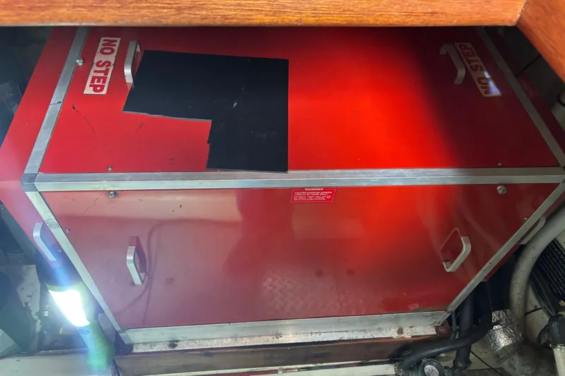 Slide: The Image of Red engine compartment labeled "No Step" on 1984 Ocean Alexander 38 Double Cabin yacht. - 29