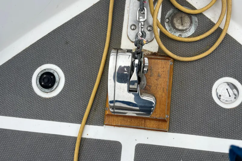 Slide: The Image of Deck equipment on 1984 Ocean Alexander 38 Double Cabin yacht, featuring winch and ropes. - 3