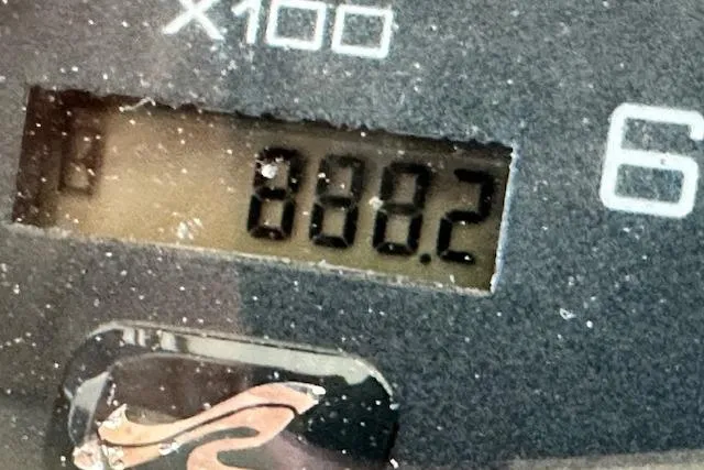 Slide: The Image of Close-up of a 2001 Sea Ray 380 Sundancer gauge displaying 880.2 hours. - 14