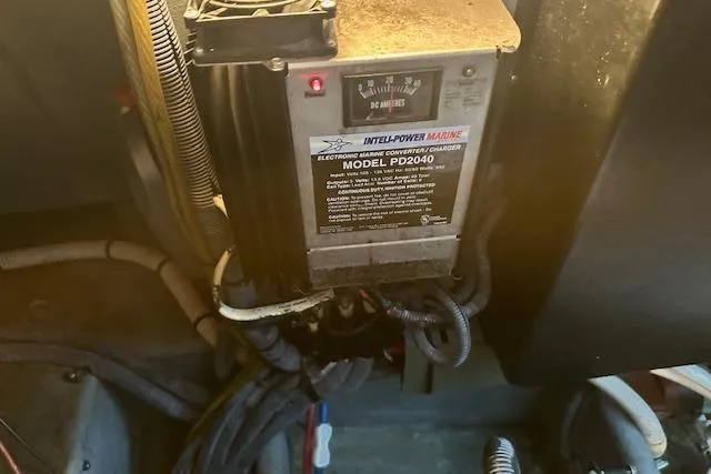 Slide: The Image of IntelliPower Marine converter charger in 2001 Sea Ray 380 Sundancer engine compartment. - 32