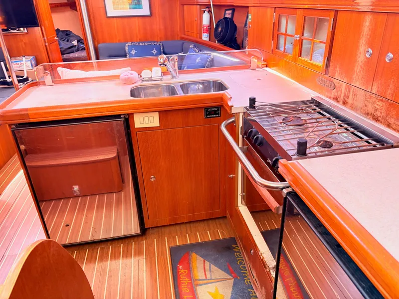 Slide: The Image of Interior view of a 2006 Hunter 38 yacht galley. - 10