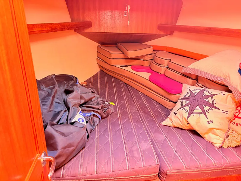 Slide: The Image of Interior of a 2006 Hunter 38 yacht with cozy sleeping cabin. - 20