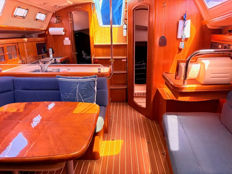Slide: The Image of Interior of a 2006 Hunter 38 yacht with wooden furnishings. - 22