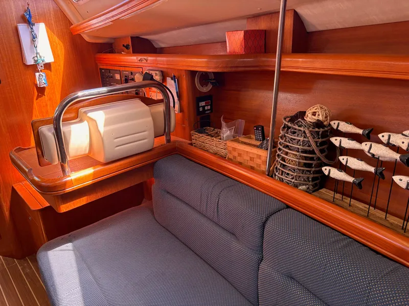Slide: The Image of Interior of a 2006 Hunter 38 yacht with wooden furnishings. - 24