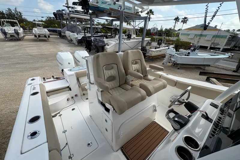 Slide: The Image of 2017 Sea Fox 288 Commander boat interior with dual seats and steering console. - 15