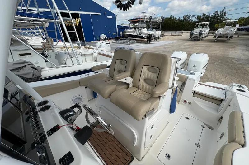 Slide: The Image of 2017 Sea Fox 288 Commander boat interior with dual seats and steering console. - 16