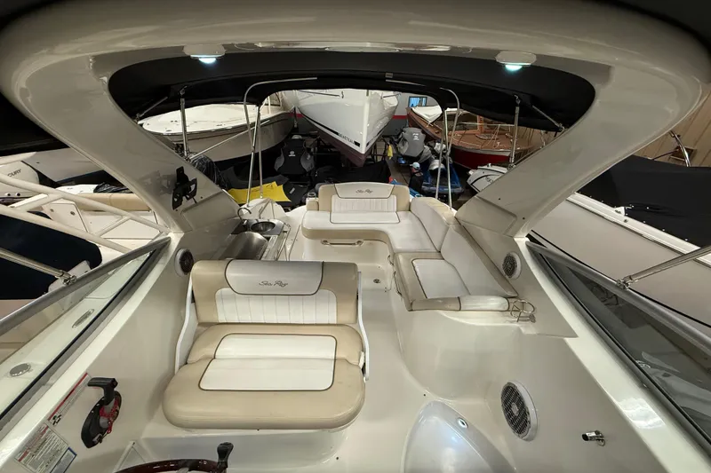 Slide: The Image of Interior view of a 2012 Sea Ray Sundancer 280 boat with beige seating. - 10