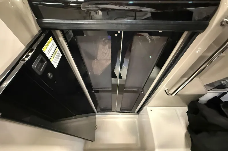 Slide: The Image of Interior view of 2012 Sea Ray Sundancer 280 cabin entrance with sliding door. - 43