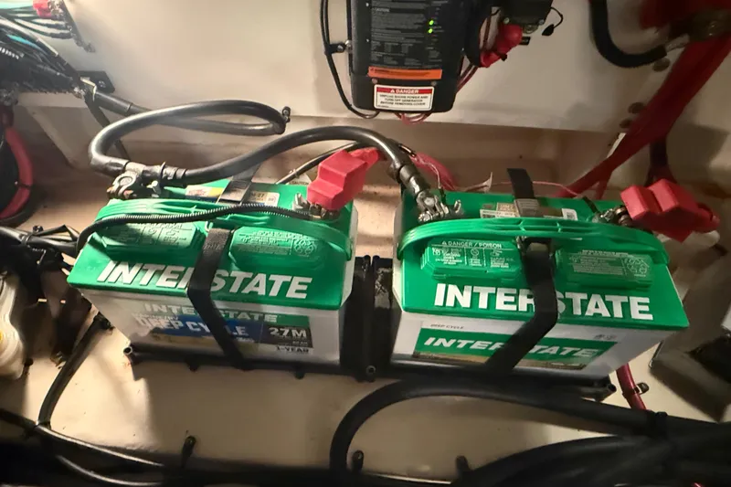 Slide: The Image of Interstate deep cycle batteries in a 2012 Sea Ray Sundancer 280 boat engine compartment. - 75