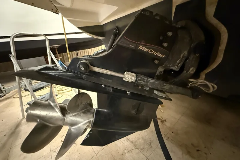 Slide: The Image of Close-up of a 2012 Sea Ray Sundancer 280 MerCruiser engine propeller. - 79