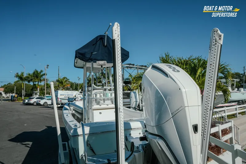 Slide: The Image of 2023 Andros 26 Tarpon boat with powerful outboard motor at dealership. - 5