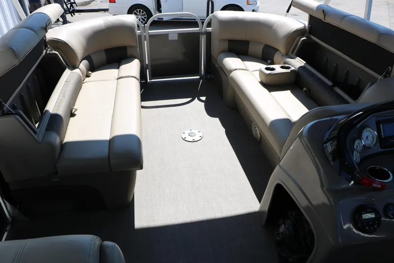 Slide: The Image of Interior of a 2021 Sun Tracker Party Barge 20 DLX pontoon boat with seating and console. - 36