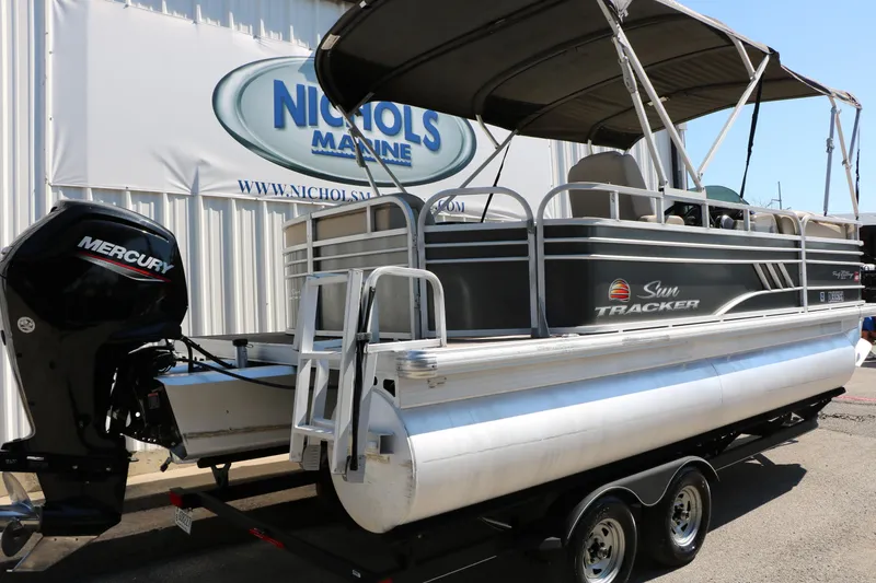 Slide: The Image of 2021 Sun Tracker Party Barge 20 DLX pontoon boat with Mercury engine at Nichols Marine. - 5