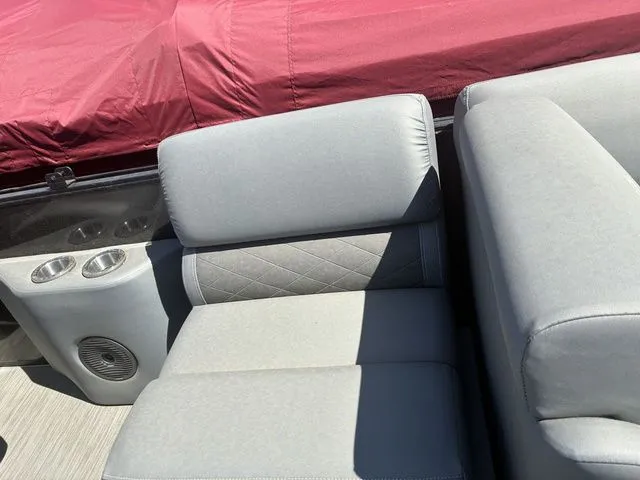 Slide: The Image of Interior of a 2022 Bennington 23LSR SPS with gray seating. - 14