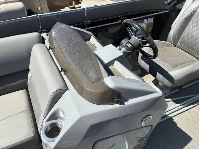 Slide: The Image of Interior of a 2022 Bennington 23LSR SPS boat with gray seating. - 15