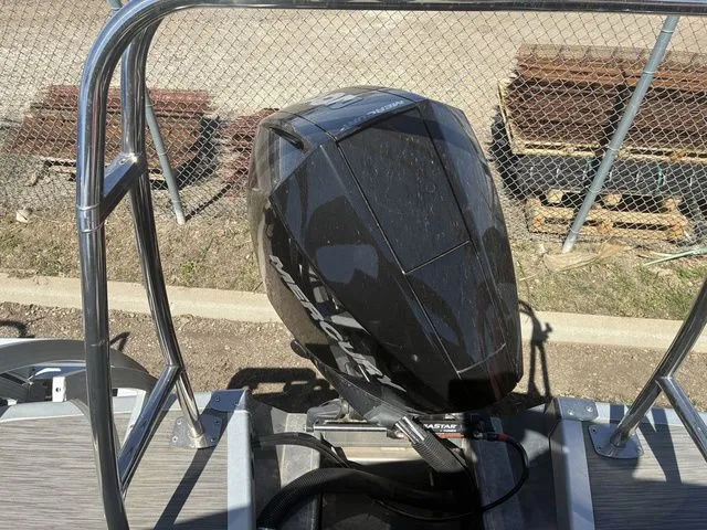 Slide: The Image of Outboard motor of a 2022 Bennington 23LSR SPS boat. - 24