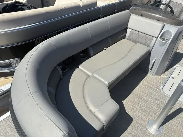 Slide: The Image of Interior of a 2022 Bennington 23LSR SPS pontoon boat with gray seating. - 9