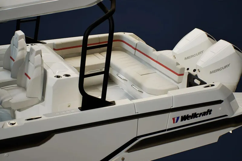 Slide: The Image of 2026 Wellcraft 28 T-Top boat with Mercury engines, featuring sleek seating and modern design. - 4