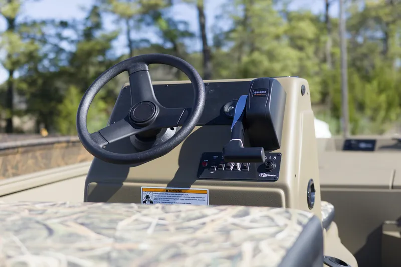 Slide: The Image of 2026 G3 Gator Tough 18 CC boat console with steering wheel and controls. - 8