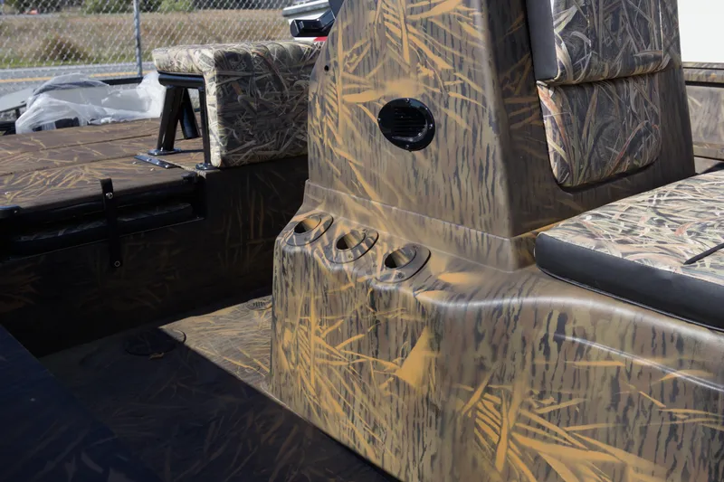 Slide: The Image of 2026 G3 Gator Tough 20 CC boat interior with camouflage design and seating. - 10