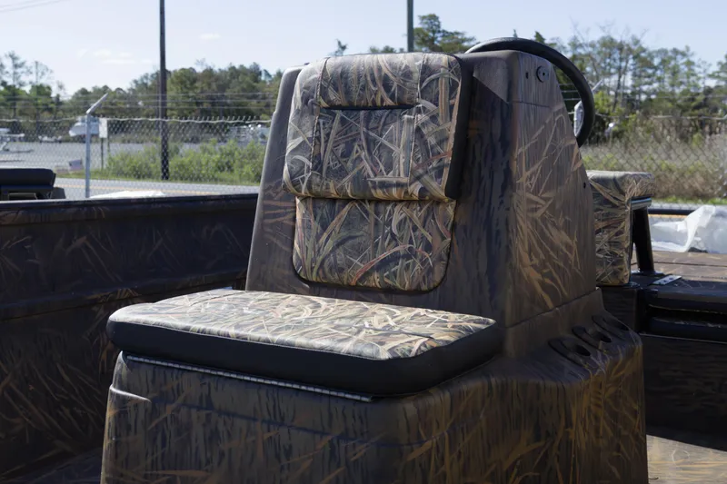 Slide: The Image of Camouflage seat on 2026 G3 Gator Tough 20 CC boat, outdoors. - 4