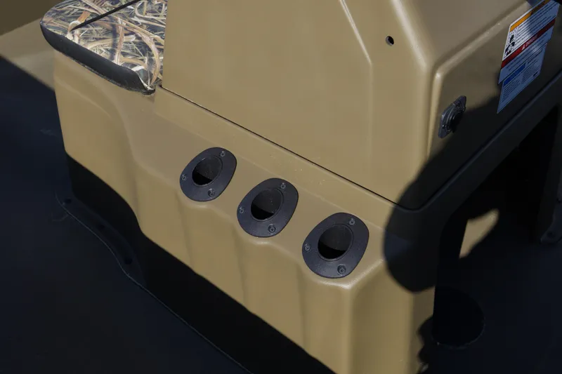 Slide: The Image of 2026 G3 Gator Tough 20 CC boat console with camouflage seat and cup holders. - 10