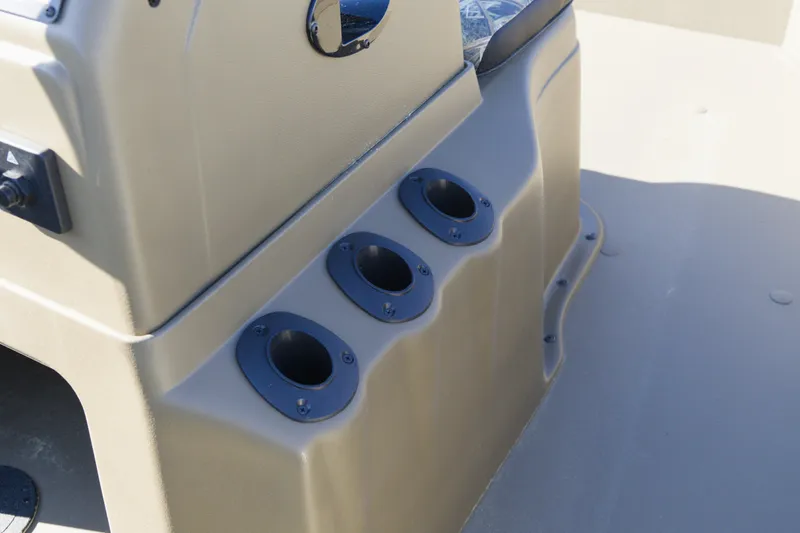 Slide: The Image of 2026 G3 Gator Tough 20 CC boat console with built-in cup holders. - 9