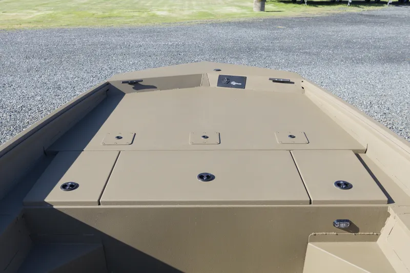 Slide: The Image of 2026 G3 Gator Tough 20 CC boat deck with storage compartments. - 10