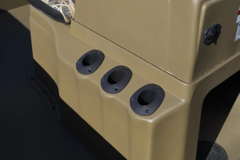 Slide: The Image of Rod holders on 2026 G3 Gator Tough 20 CC boat, beige interior detail. - 11