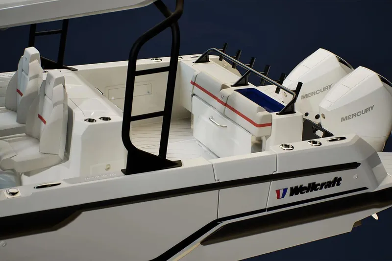 Slide: The Image of 2026 Wellcraft 28 T-Top boat with Mercury engines, sleek design, and modern seating. - 4